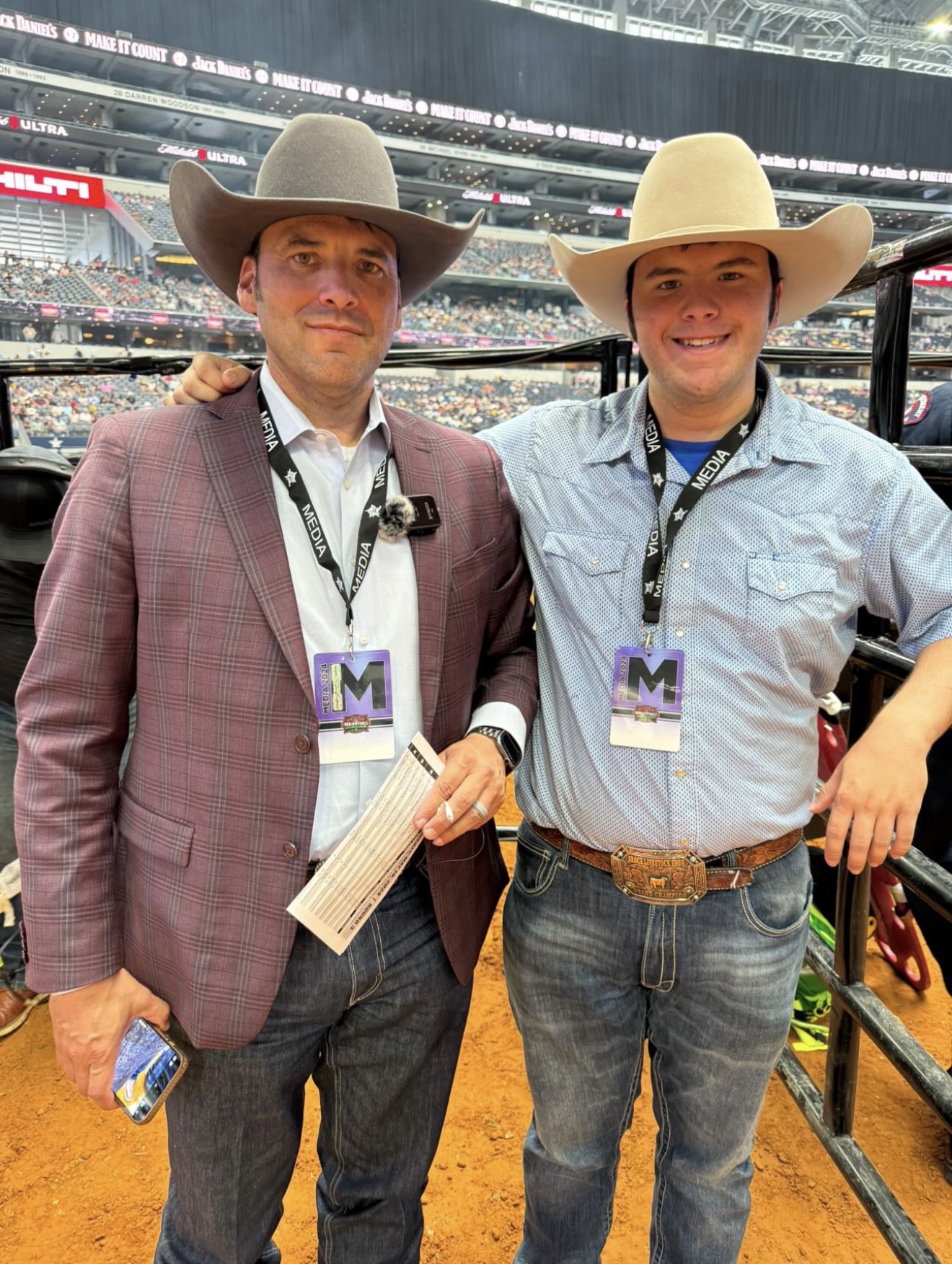 Matt at a major rodeo arena with media credentials
