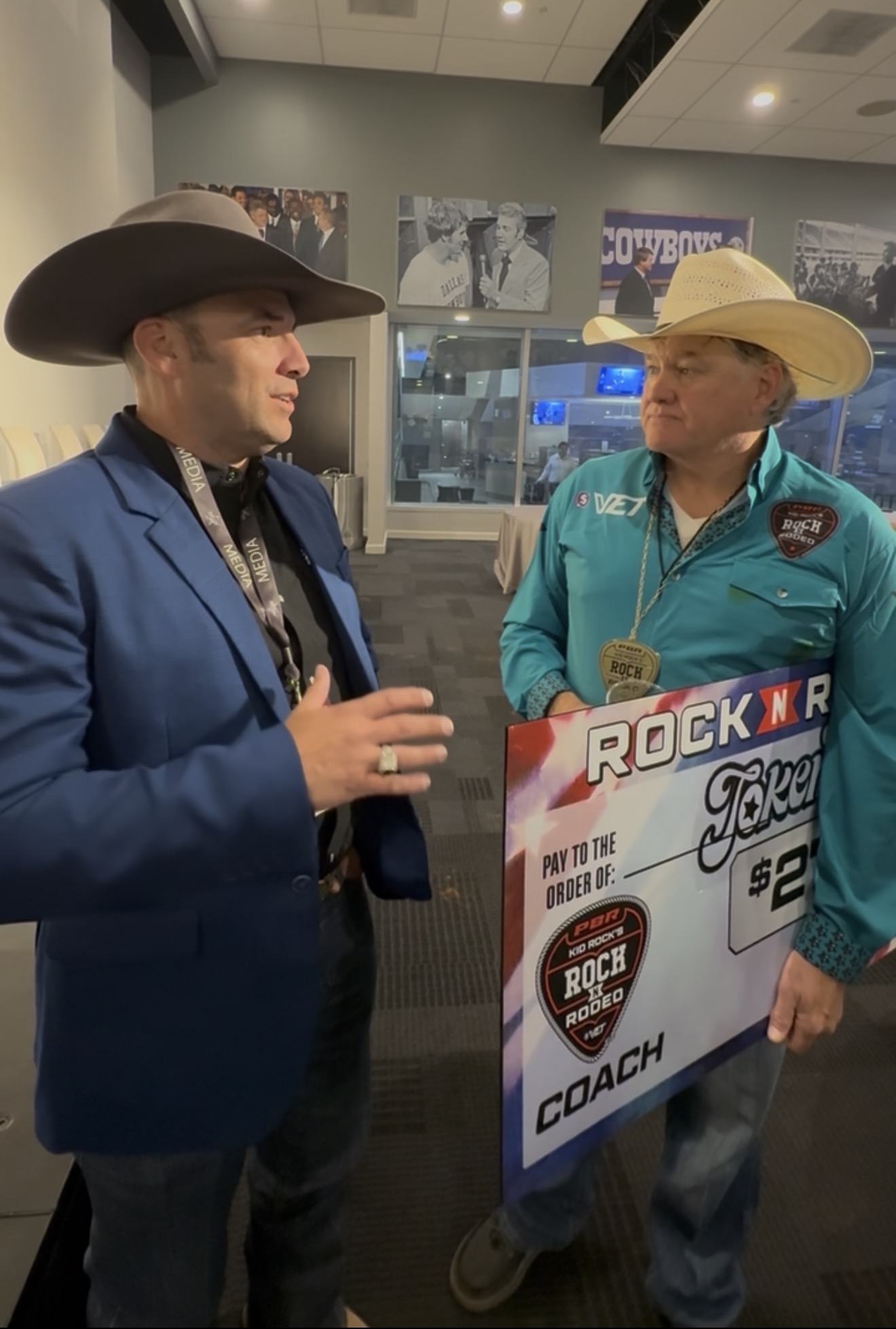 Matt speaking with a rodeo participant